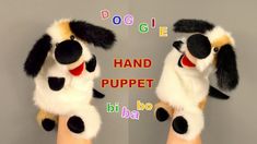 two stuffed dogs that are sitting on their hands with the words doggie and hand puppet above them