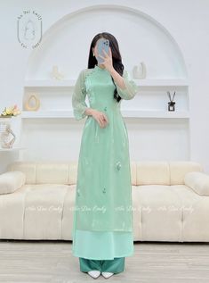 🌻Materia: Vải tơ voan Stretchy level: 0/10 This set includes: 1 ao dai top and 1 pants 🌻 The measurement of this ao dai (long dress) is in Vietnamese size (American size tends to be bigger for the same size). Please LOOK AT THE SIZE CHART CAREFULLY BEFORE ORDERING. There might have some chalk writings on the fabric due to making process. These marks can be washed away easily. 🌻🌻No returns or exchanges Buyer can contact seller about any issues with an order. 🌸 Follow us Facebook/aodaiemily www.aodaiemily.com 💜 Thank you very much!💜 Green Ao Dai For Wedding, Green Ao Dai For Spring Wedding, Fitted Ao Dai With Floral Embroidery For Festive Occasions, Spring Wedding Green Ao Dai, Festive Fitted Ao Dai With Floral Embroidery, Festive Long Ao Dai With Floral Embroidery, Chalk Writing, Long Kurti, Long Kurti Designs