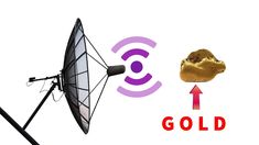 an antenna with gold on it next to a cell phone