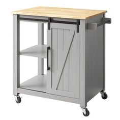 a kitchen cart with a wooden top and sliding doors