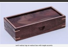 a wooden box with a handle on it