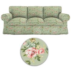 a green floral couch with pink roses on it and a round rug in the middle