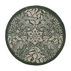 a green and white plate with an intricate design