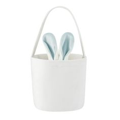 three plastic spoons in a white basket