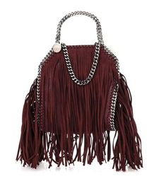 This is an authentic STELLA MCCARTNEY Shaggy Deer Fringe Tiny Falabella Tote Color Plum. This stylish tote is crafted of fine animal friendly faux leather in burgundy with fringe detail. The bag is bordered with a signature silver-curb chains that continue as a shoulder strap and top handles. The top opens with a magnetic closure to a jacquard dusty rose fabric interior with a patch pocket. Excellent clean condition, used 2-3 times Without dust bag Stored in a smoke & pet free home ❌ Please check pictures as they are part of description The item you see is the EXACT item you are receiving❌ ❌colors might be different in person than on computers, cells, ipads, ect cause of flash and lighting. ❌please read description, item specifics, condition, and look at all pics for info on the item❌ Plea Dusty Rose Fabric, Rose Fabric, Stella Mccartney Falabella, Stella Mccartney Bag, Jackson Hole, Be Different, Dusty Rose, Magnetic Closure, Stella Mccartney