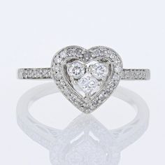 14k White Gold Diamond Double Heart Ring This Beautiful Ring Is Made Of 14 Karat White Gold, Featuring A Distinctive Double Heart Design, Making For The Perfect Gift To Profess Your Love. The Diamonds Are Placed In Prong Settings & Sparkle In Sunlight Nicely But Are Small Enough That It Won’t Demand Too Much Attention. The Band Is A Size 5.25, But Is Resizable. "14kt" & An "F" Maker's Mark Are Stamped Within. Metal: 14 Karat Yellow Gold Stones: Diamonds In Various Sizes (.56 Carat Total) Size: 5.25 (Resizable) // 1.8mm Band Width // 9.8mm Heart Height Weight: 2.10dwt // 3.26grams 804920-1 * Av129 Double Heart Ring, Double Heart, Maker's Mark, Beautiful Ring, Heart Design, Womens Jewelry Rings, White Gold Diamonds, Prong Setting, Beautiful Rings