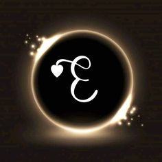 the letter e is inscribed in white on a black background with sparkles around it