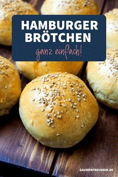 some bread buns with sesame seeds on top and the words hamburger brotchn