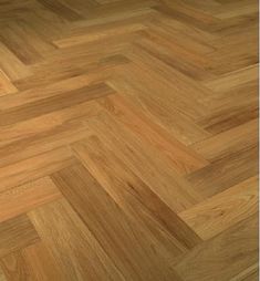 an image of wood flooring that looks like herringbones