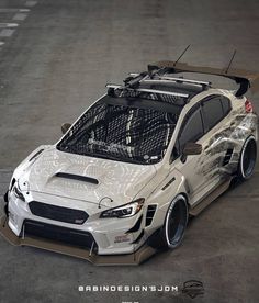 the subaru wrd - r looks like it has been modified into a racing car