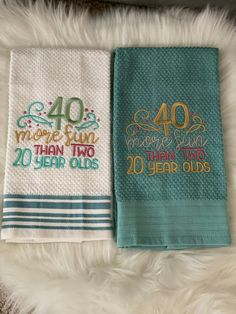 two hand towels with the words 40 years old on them