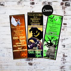 three halloween bookmarks on a brick wall