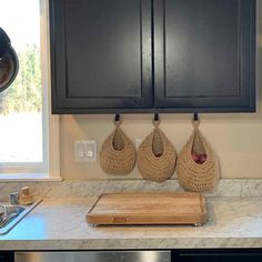 the kitchen counter is clean and ready to be used as a cutting board or oven mitts