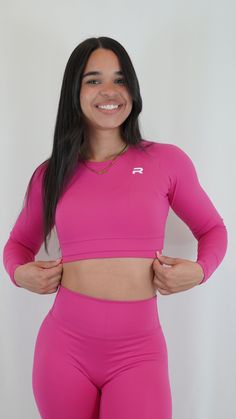 Experience ultimate comfort and style with our Functional Fitted Long Sleeve Crop Top! Made with quick-dry, breathable, and stretchy fabric, this top is perfect for your active lifestyle. The functional collection combines functionality and fashion for a winning combination. Upgrade your workout wardrobe now! Pink Bra Top, Pink Cropped Top, Black Long Sleeve Crop Top, Knitted Swimsuit, Fitted Long Sleeve, Workout Crop Top, Tank Top Bras, Gym Tops, Rosa Pink