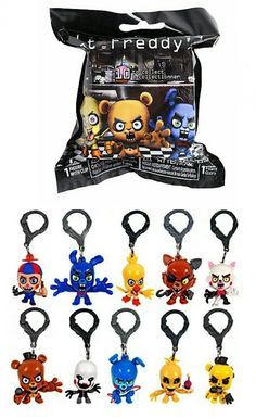 an assortment of key chains with cartoon characters on them, all in different colors and sizes