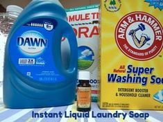 a bottle of dawn liquid next to a box of dawn laundry detergent and a carton of dawn soap