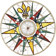 an artistically designed compass is shown in gold, blue, red and green colors