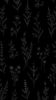 black and white floral pattern on a dark background