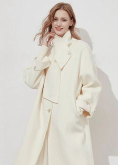 Indulge in sophistication with this luxury cream double-faced wool coat. Its single-breast design and included scarf add a touch of elegance. Made from premium quality wool, you'll not only look elegant, but feel warm and comfortable. Upgrade your wardrobe with this timeless piece. Details & care Scarf Front single-breasted button closure 100% wool Women's coat Item #312191 Machine wash, dry flat Size info XS=US2=UK6=EU32 S=US4-6=UK8-10=EU34-36 M=US8-10=UK12-14=EU38-40 ★★ It would be helpful if Wool Overcoat, Premium Quality, Height And Weight, Single Breasted, Wool Coat, Timeless Pieces, Coats For Women, Wardrobe, Wool