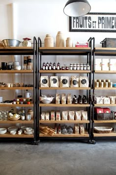 the shelves are filled with different types of food