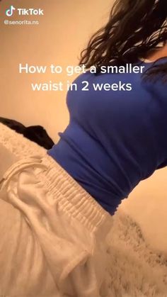 a woman laying on top of a bed with her arms in the air and text reading how to get a smaller waist in 2 weeks