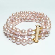 Three strands of gorgeous nude (natural pink) pearls in a classic cuff bracelet. Custom made to fit properly or choose an adjustable clasp if you are not exactly sure of the wrist size. Pearl type: Fr Pearl Pink Color, 1800s Jewelry, Pink Pearl Jewelry, Pink Pearl Bracelet, Cultured Pearl Bracelet, Fancy Jewelry Necklace, Pearl Necklace Designs, Pink Pearls, Pearl Bangle