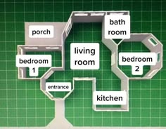 the floor plan for a living room is shown in white and black letters on green background