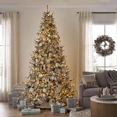 a decorated christmas tree in a living room