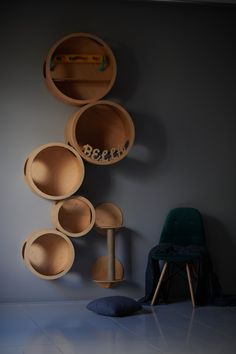 several wooden objects are hanging on the wall