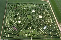 an aerial view of a large maze in the middle of a field