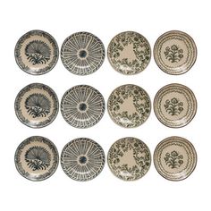 nine plates with different designs on them