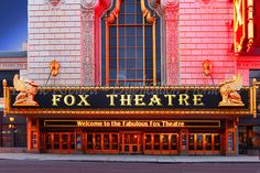 the fox theatre is lit up at night