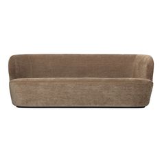 a brown couch sitting on top of a white floor