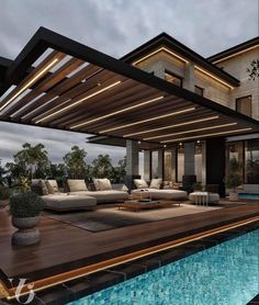 an outdoor living area next to a swimming pool