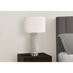 Make your room shine with this stylish and fashionable 29"h table lamp! The modern designed, grey resin cylinder textured base and polished silver metal accent is topped with a ivory linen drum shade, and finished with an elegant silver finial. Grey Lamp, Fixture Table, Grey Table Lamps, Vase Shapes, Elegant Bedroom, Bedroom Lamps, Curtain Accessories, Modern Fabric, Drum Shade