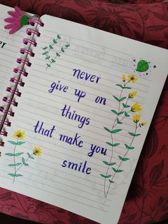 a notepad with writing on it that says never give up on things that make you smile