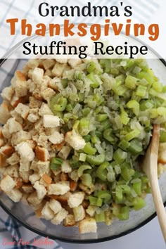 a glass bowl filled with stuffing next to a wooden spoon on top of a table