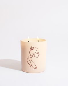 a candle that has a drawing on it