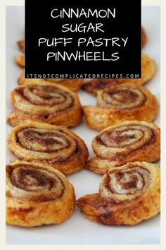 cinnamon sugar puff pastry pinwheels on a plate with text overlay that reads, cinnamon sugar puff pastry pinwheels the perfect dessert