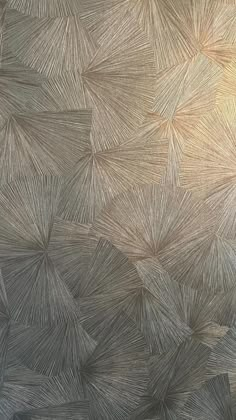 an artistic textured wallpaper design in grey and white