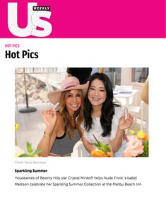 two women in hats posing for a photo on the cover of us hot pics