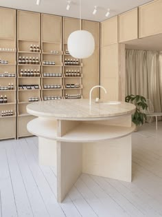 the instagram page shows an image of a room with wooden cabinets and shelves, which are