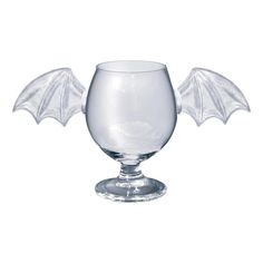 a glass with a bat shaped handle on it's top and wings spread out to the side