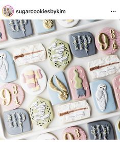 the cookies are decorated in pastel colors