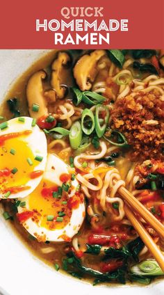 a bowl filled with noodles, meat and vegetables next to an egg on top of some chopsticks