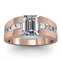 an emerald cut diamond ring with channeled diamonds on the sides and side stones set in 18k rose gold