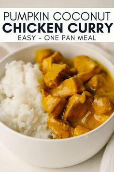 a white bowl filled with chicken curry and rice