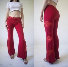 "JOLENE FLARES  Made for kicking, dancing and living.  Sourced in a vintage shop in Italy, these beautiful rare red flares are here to add some spice to your life. Style her with some heels (top is optional), and you are ready to rock anyone's world.  - Vintage Item  - Size XS / S (modelled on a size M)   - Side zip  - Lace Detail     Our model is:  5\"6 Bust 35\" (34D) Waist 27\" Hips 39'  Shipped to you within 1-2 working days. All items are vintage, with varying ages. All will have varying degrees of signs of age. Please do not compare them to brand-new items bought from fast fashion companies. HOW TO WASH / CARE?  Most of our items will have the original care labels still inside, so please read and follow them carefully. We suggest hand washing all items if in doubt. The best way to st Vintage Stretch Bottoms For Festival, Vintage Fitted Bottoms For Festival, Red Fitted Cotton Pants, Fitted Red Cotton Pants, Fitted Cotton Pants For Festival, Red Stretch Retro Bottoms, Red Retro Stretch Bottoms, Stretch Red Bottoms For Festival, Red Stretch Pants For Festivals