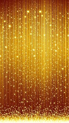 an abstract gold background with sparkles