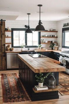 a large kitchen with an island in the middle